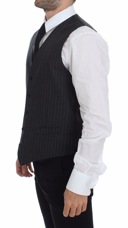 Gilet Dolce & Gabbana en laine grise à rayures avec logo, veste chic pour homme ou femme.