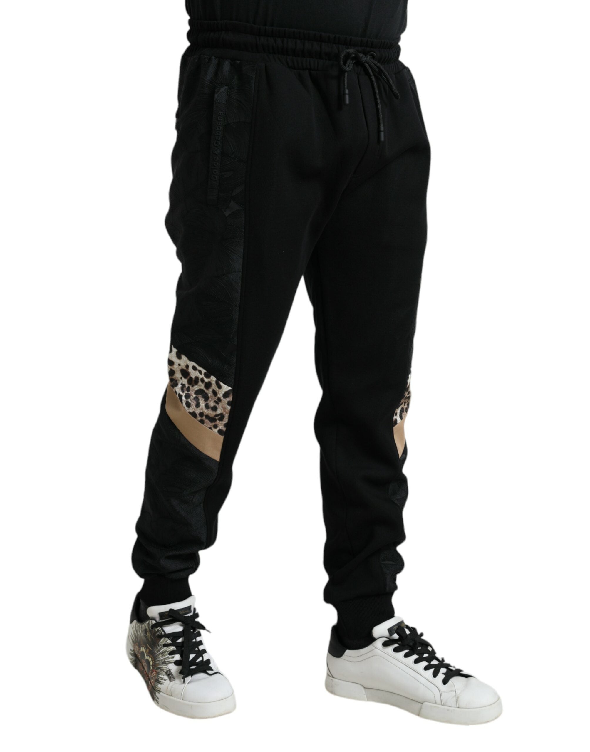 Pantalons joggers slim en coton stretch noir de Dolce & Gabbana, style décontracté et ajusté.