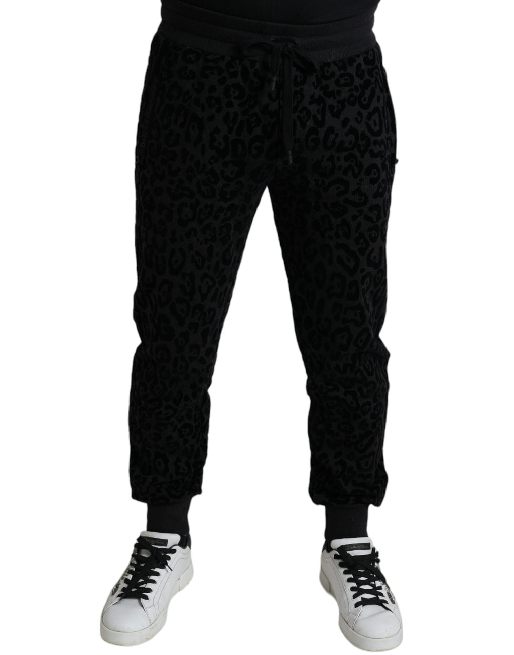 Pantalons joggers slim fit en coton noir avec motif léopard de Dolce & Gabbana, élégants et confortables.