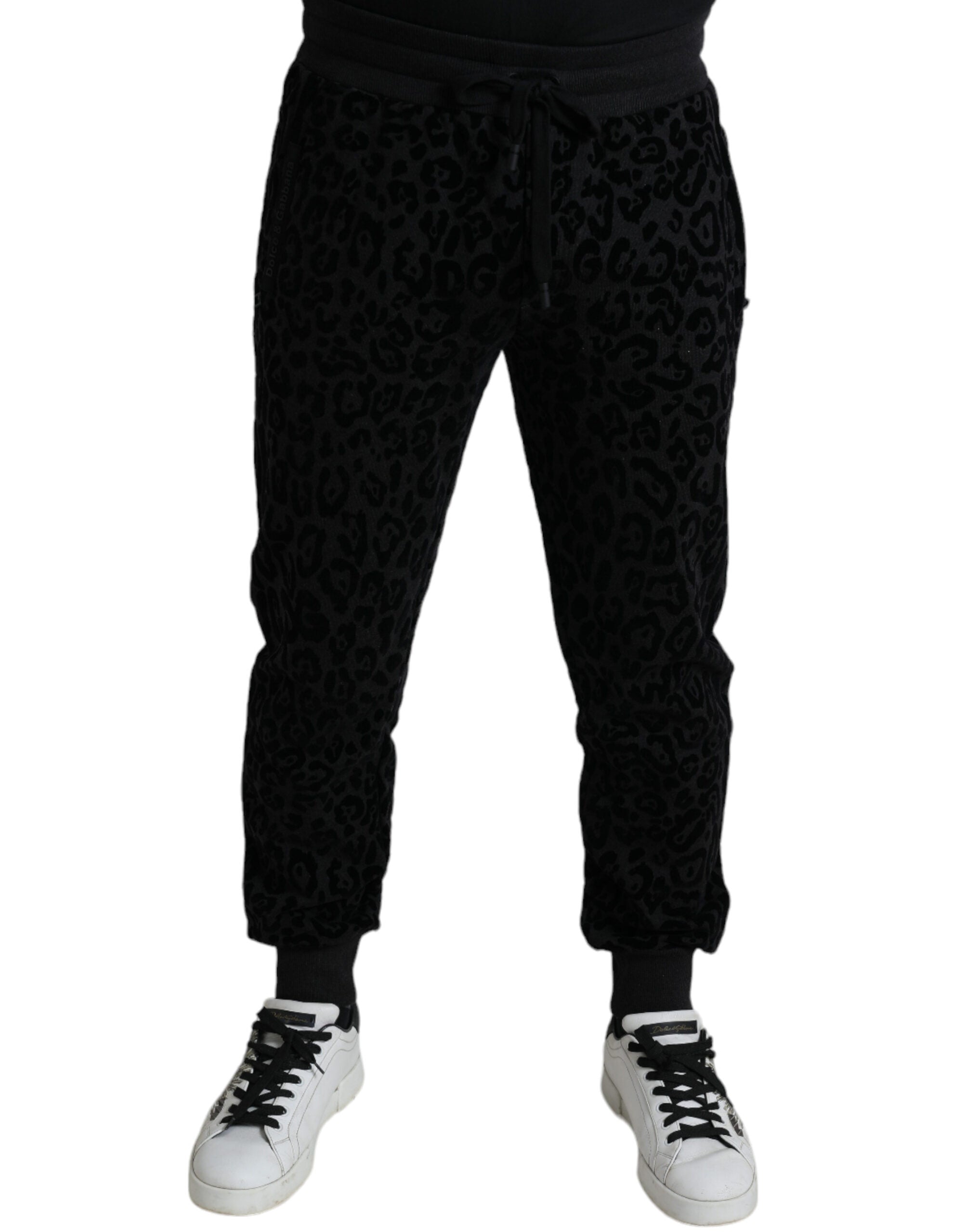 Pantalons joggers slim fit en coton noir avec motif léopard de Dolce & Gabbana, élégants et confortables.