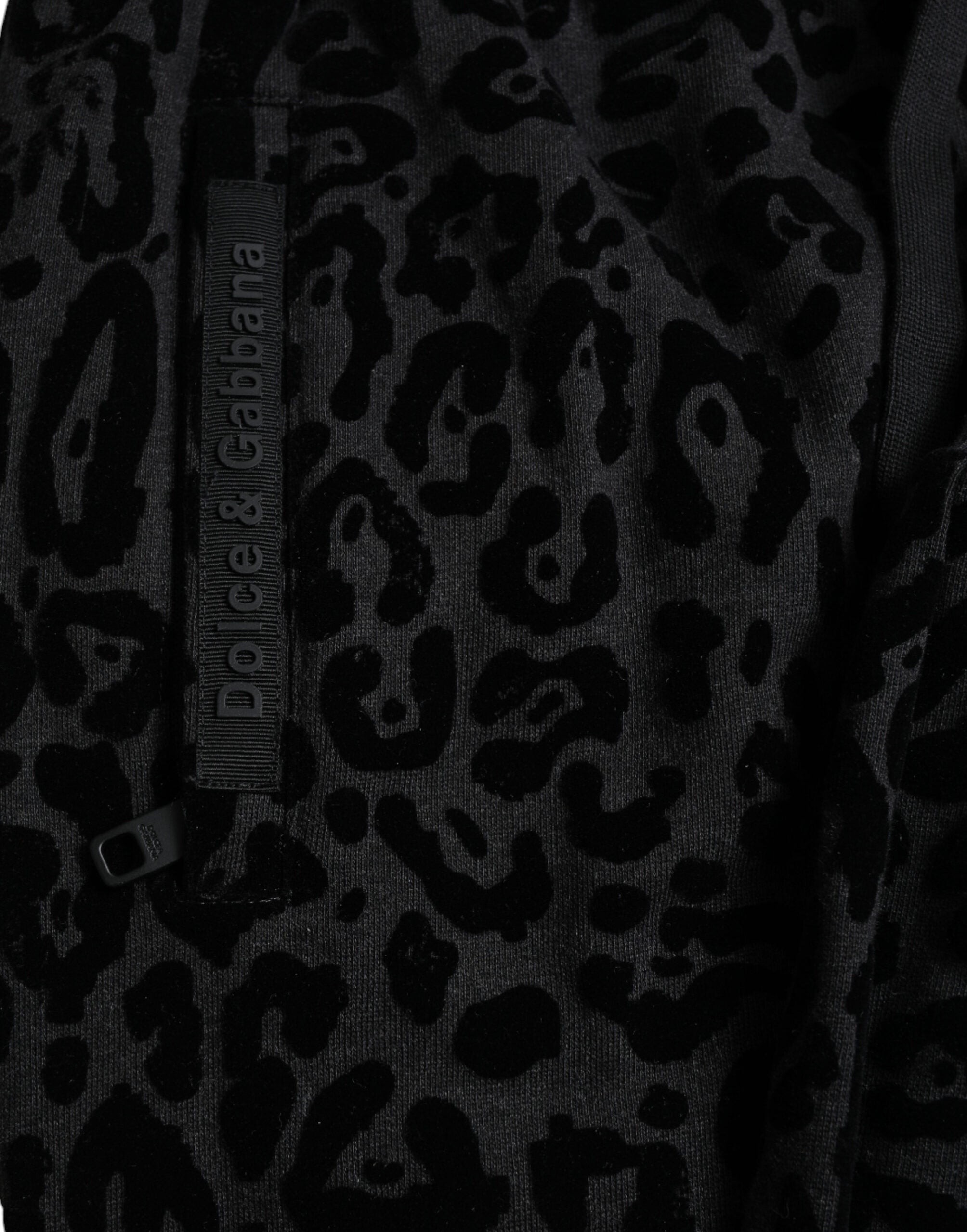 Pantalons jogger slim en coton noir à motif léopard de Dolce & Gabbana, coupe ajustée et style élégant.