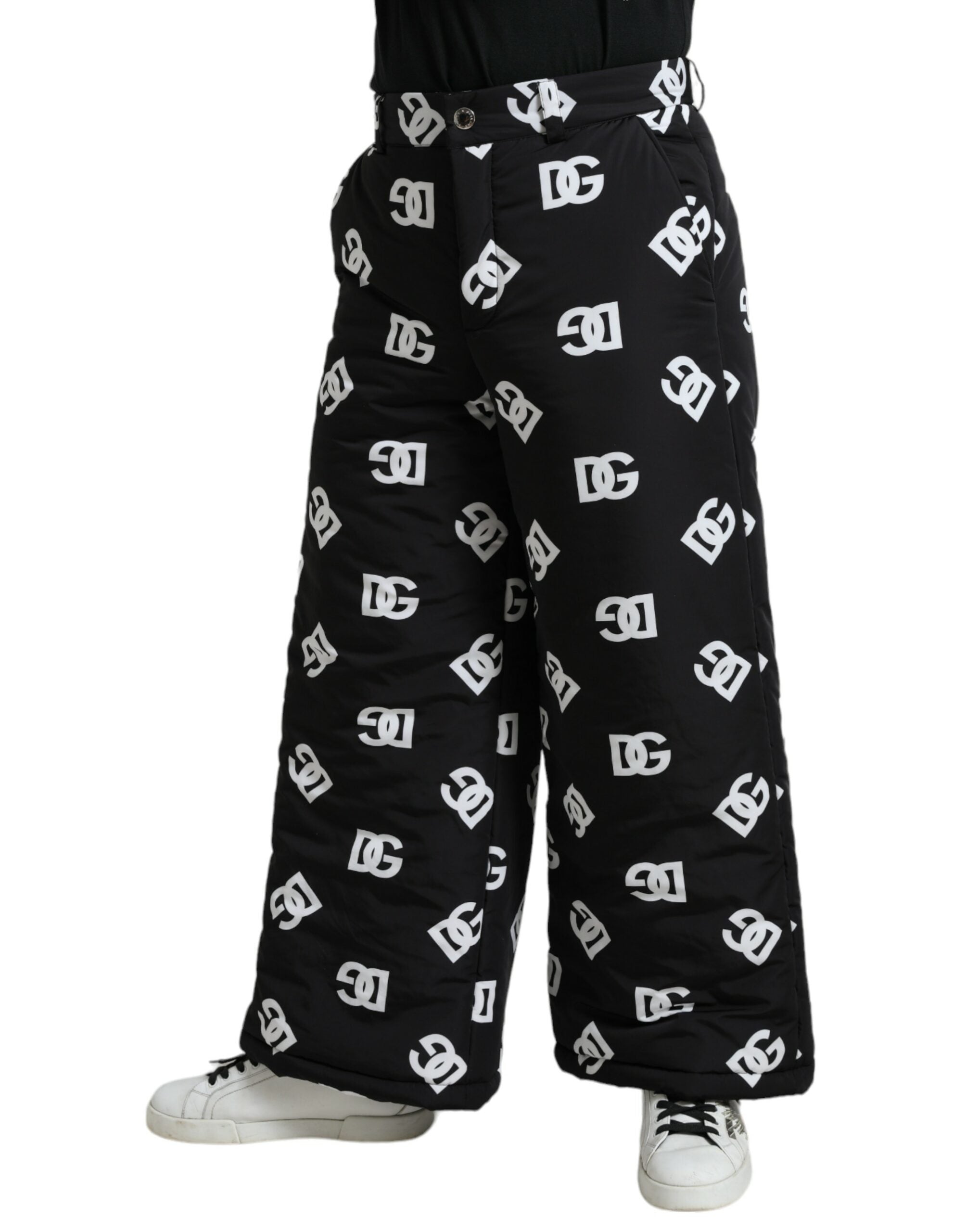 Pantalons larges Dolce & Gabbana noirs avec logo DG imprimé et design élégant, vue de face sur un fond neutre.