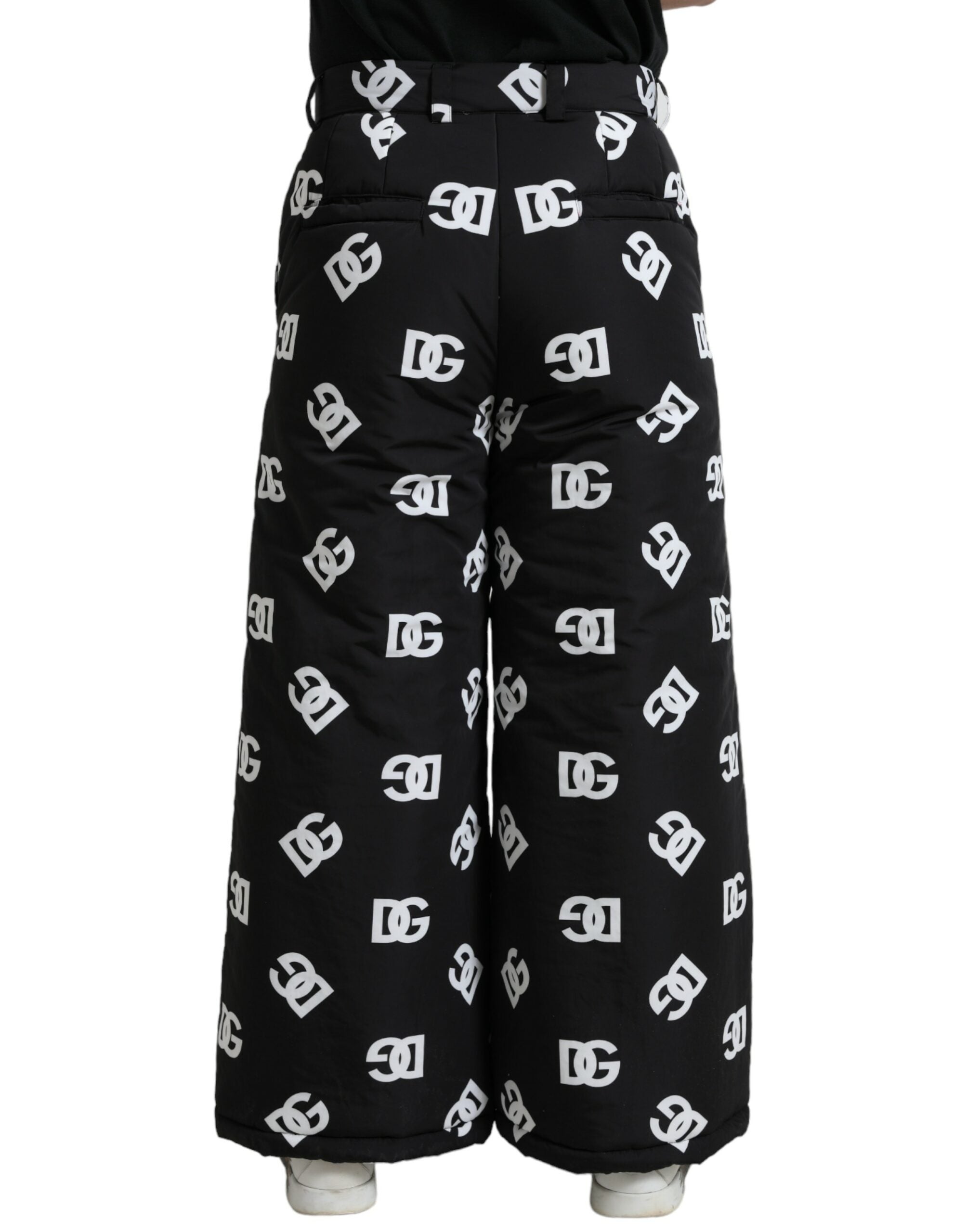 Pantalons larges noirs Dolce & Gabbana avec logo DG imprimé, style élégant et décontracté, vue de face.