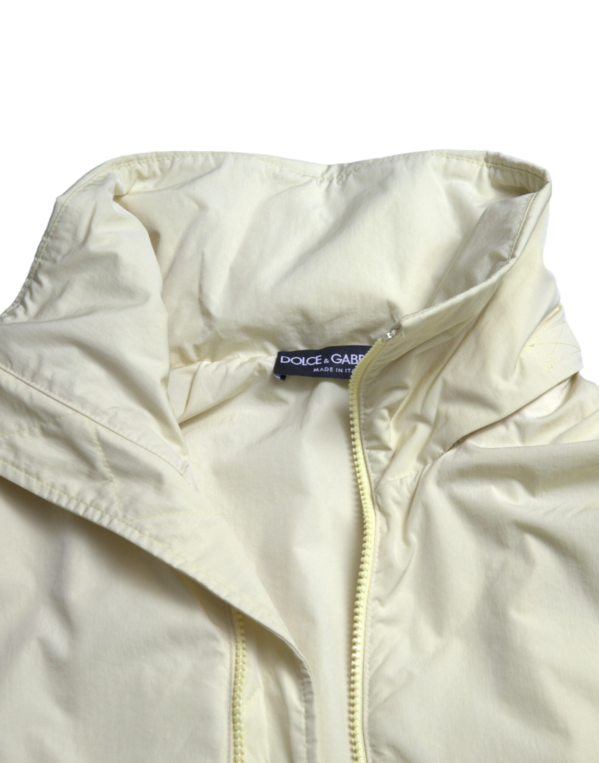 Veste parka en nylon jaune avec col et zip complet de Dolce & Gabbana, vue de face.
