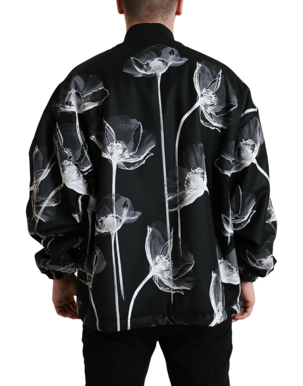 Veste bomber en laine noire à imprimé floral Dolce & Gabbana avec boutons, style élégant et tendance.