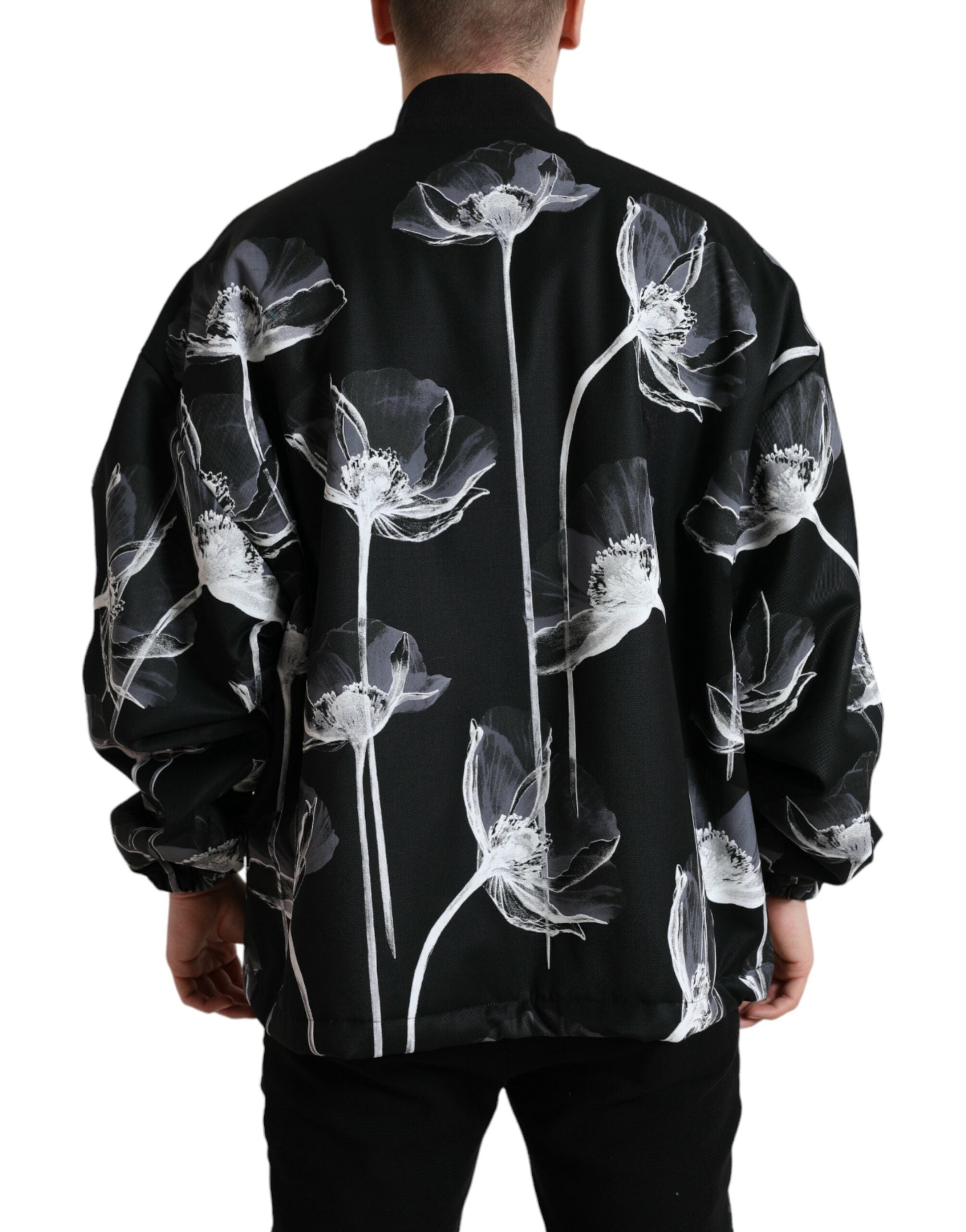 Veste bomber en laine noire à imprimé floral Dolce & Gabbana avec boutons, style élégant et tendance.