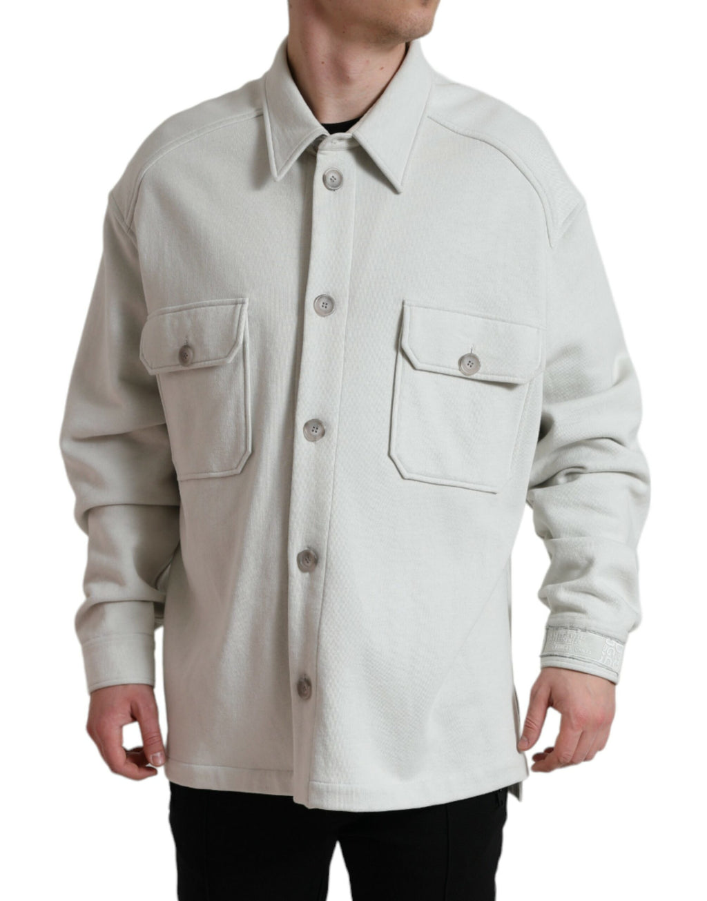 Veste grise en coton Dolce & Gabbana avec col montant et boutons, vêtement élégant pour homme ou femme.