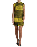 Robe courte sans manches Dolce & Gabbana à motif houndstooth jaune, coupe évasée et style élégant.