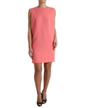 Robe courte sans manches en laine vierge rose de Dolce & Gabbana, détails élégants et coupe moderne visible sur l'image.