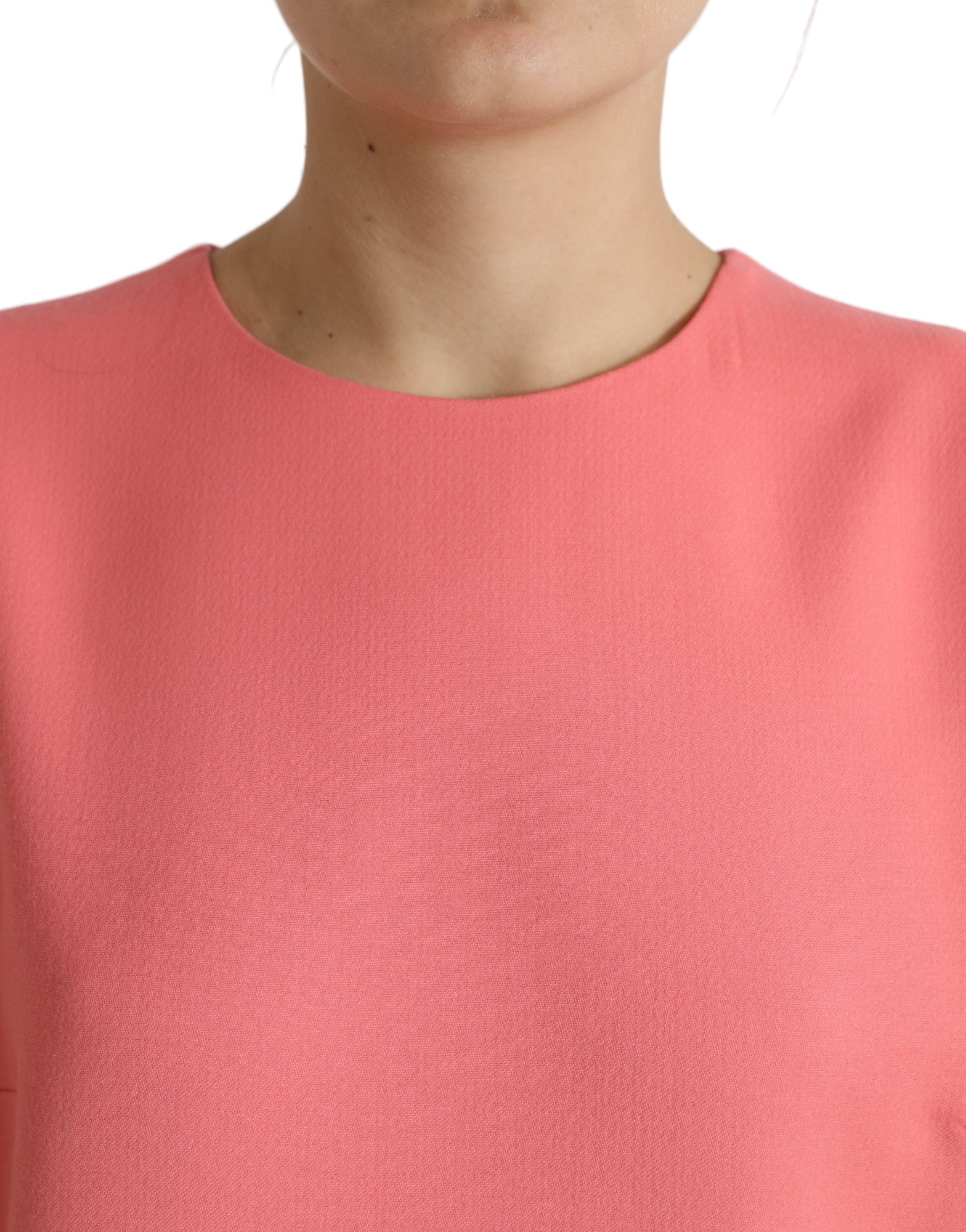 Robe courte sans manches en laine vierge rose de Dolce & Gabbana, adaptée pour une allure élégante et estivale.