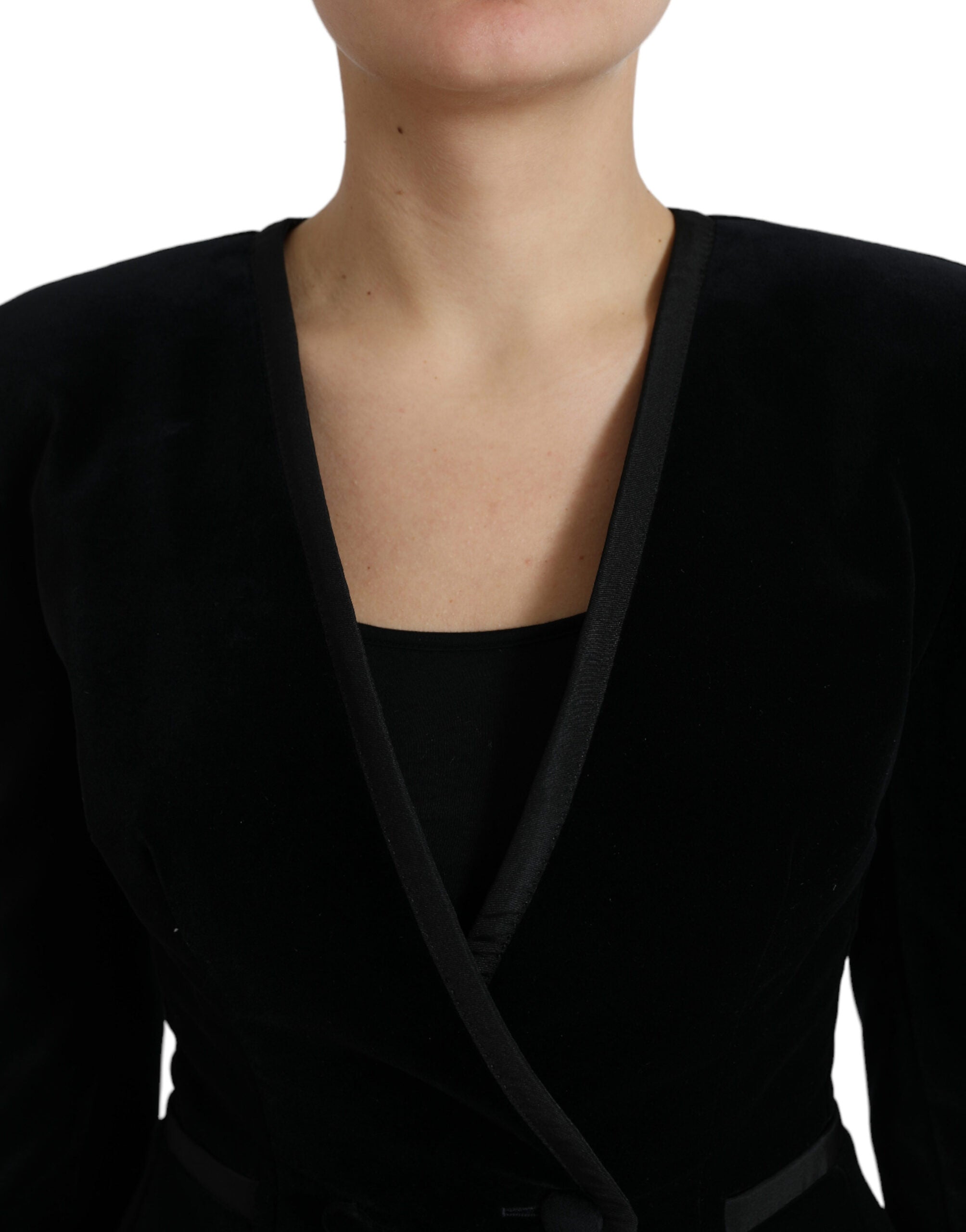 Veste en velours noir Dolce & Gabbana en coton à double boutonnage, élégante et sophistiquée, portée sur un mannequin.