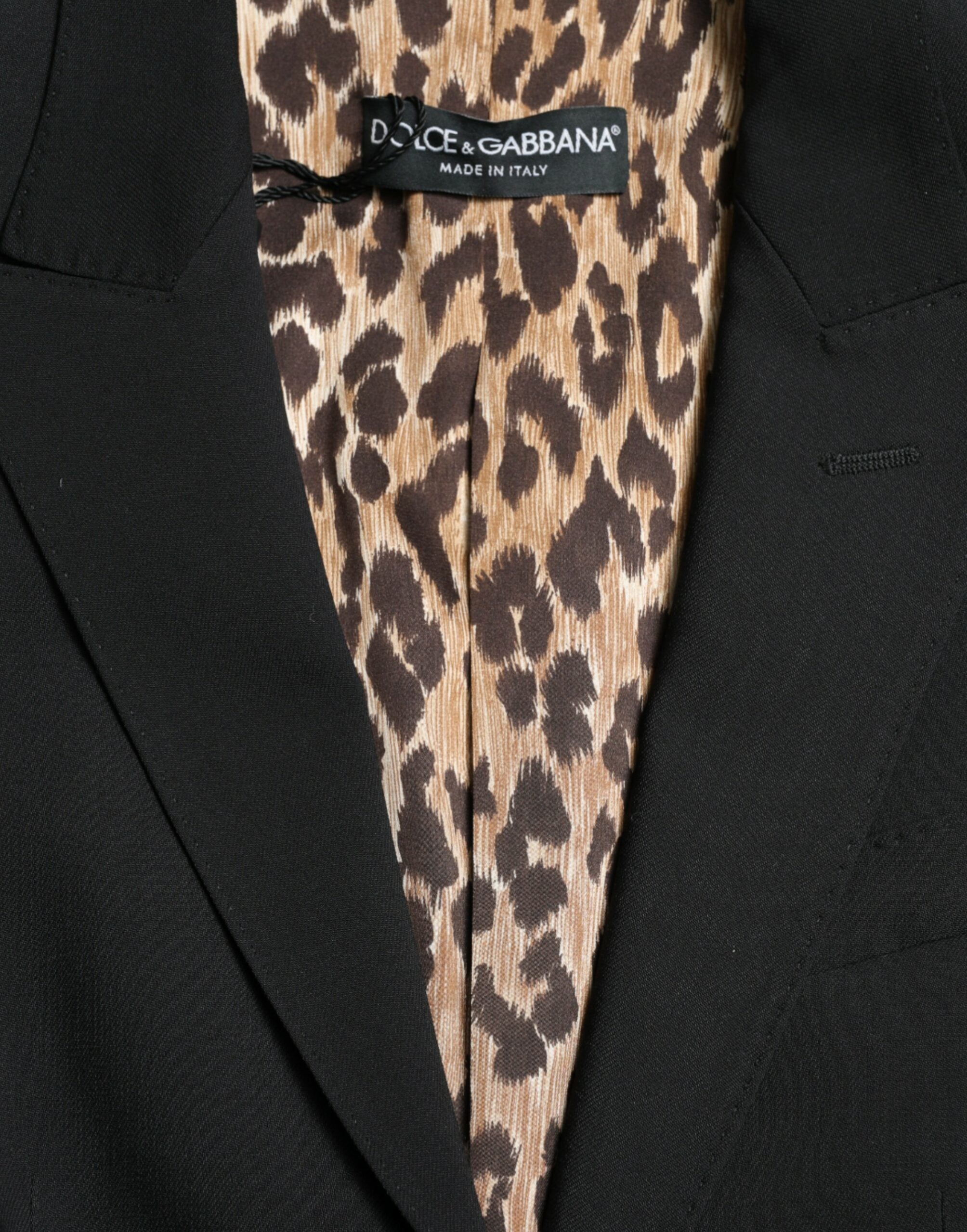 Veste blazer en laine noire Dolce & Gabbana à double boutonnage, style élégant et classique pour femme.