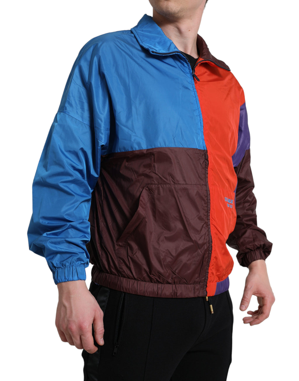 Veste coupe-vent multicolore Dolce & Gabbana avec motifs colorés, style décontracté et détails modernes.