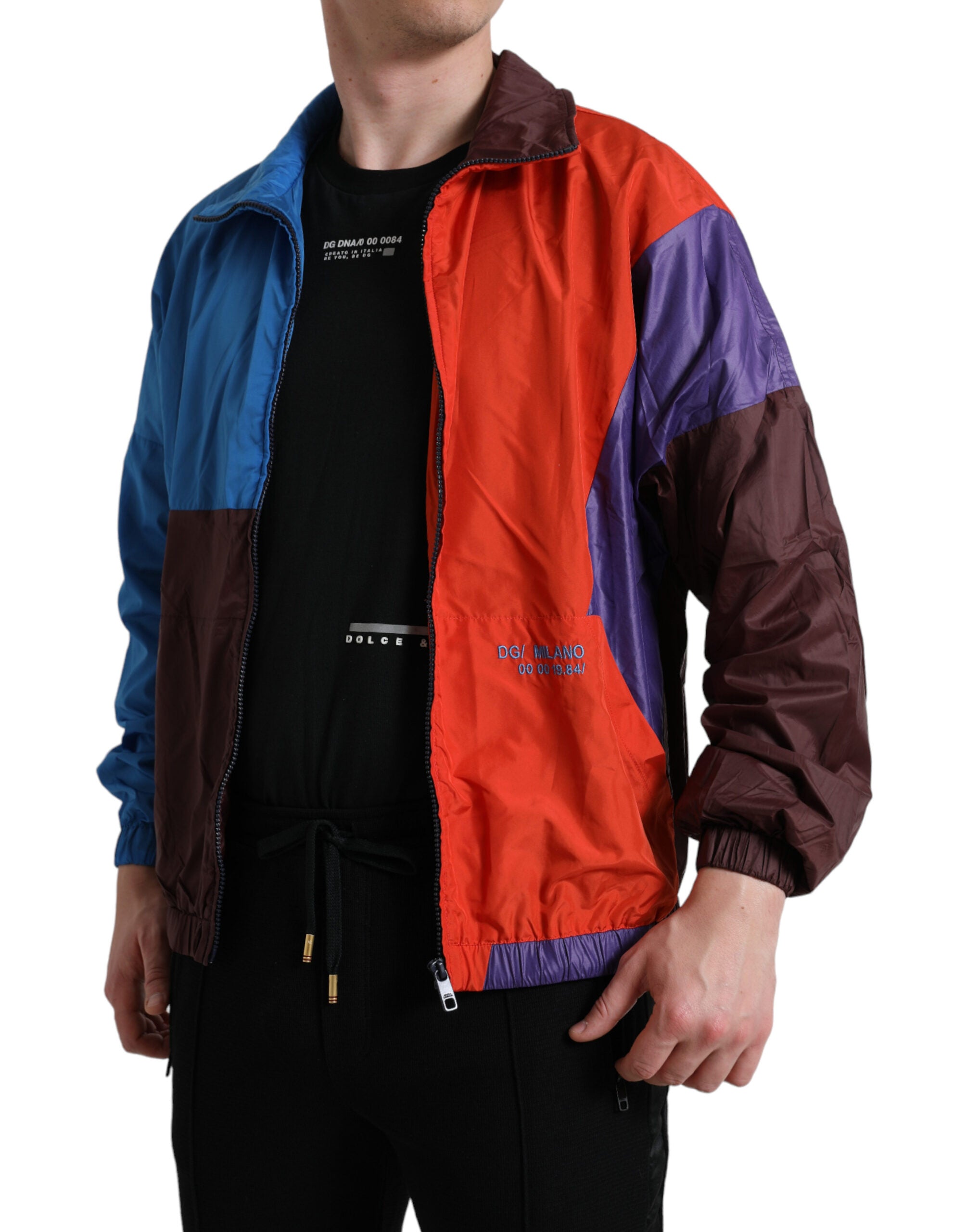 Veste coupe-vent multicolore Dolce & Gabbana avec design coloré et logo, vue de face, tissu léger et moderne.