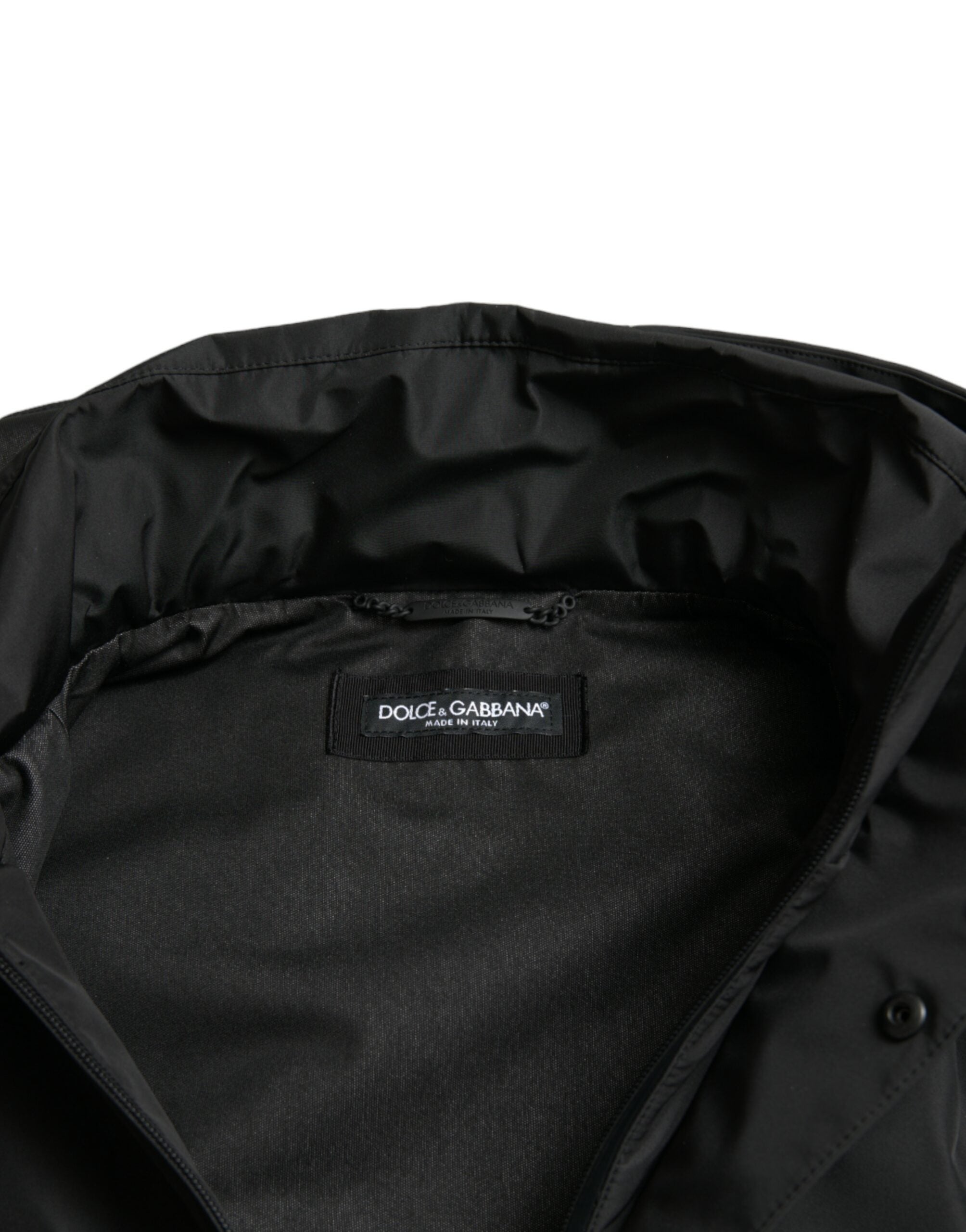 Veste à capuche en polyester noir Dolce & Gabbana avec logo en plaque, décontractée et élégante, visible sur l'image.