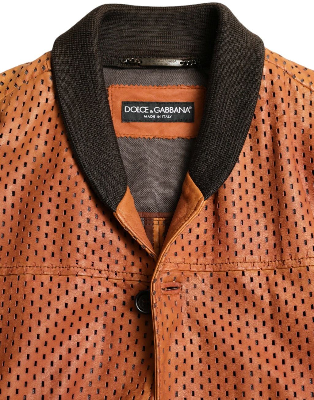 Veste en cuir d'agneau perforé marron Dolce & Gabbana, style élégant avec détails sophistiqués et finition raffinée.
