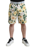 Shorts bermuda en denim Dolce & Gabbana à imprimé floral multicolore, mode estivale élégante et colorée.