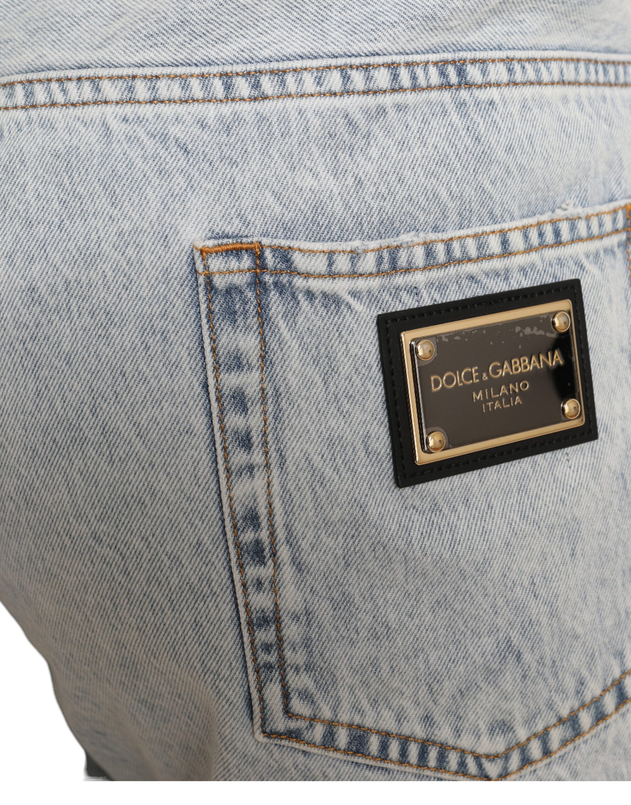 Shorts bermuda en denim Dolce & Gabbana à imprimé floral multicolore, style élégant et coloré.