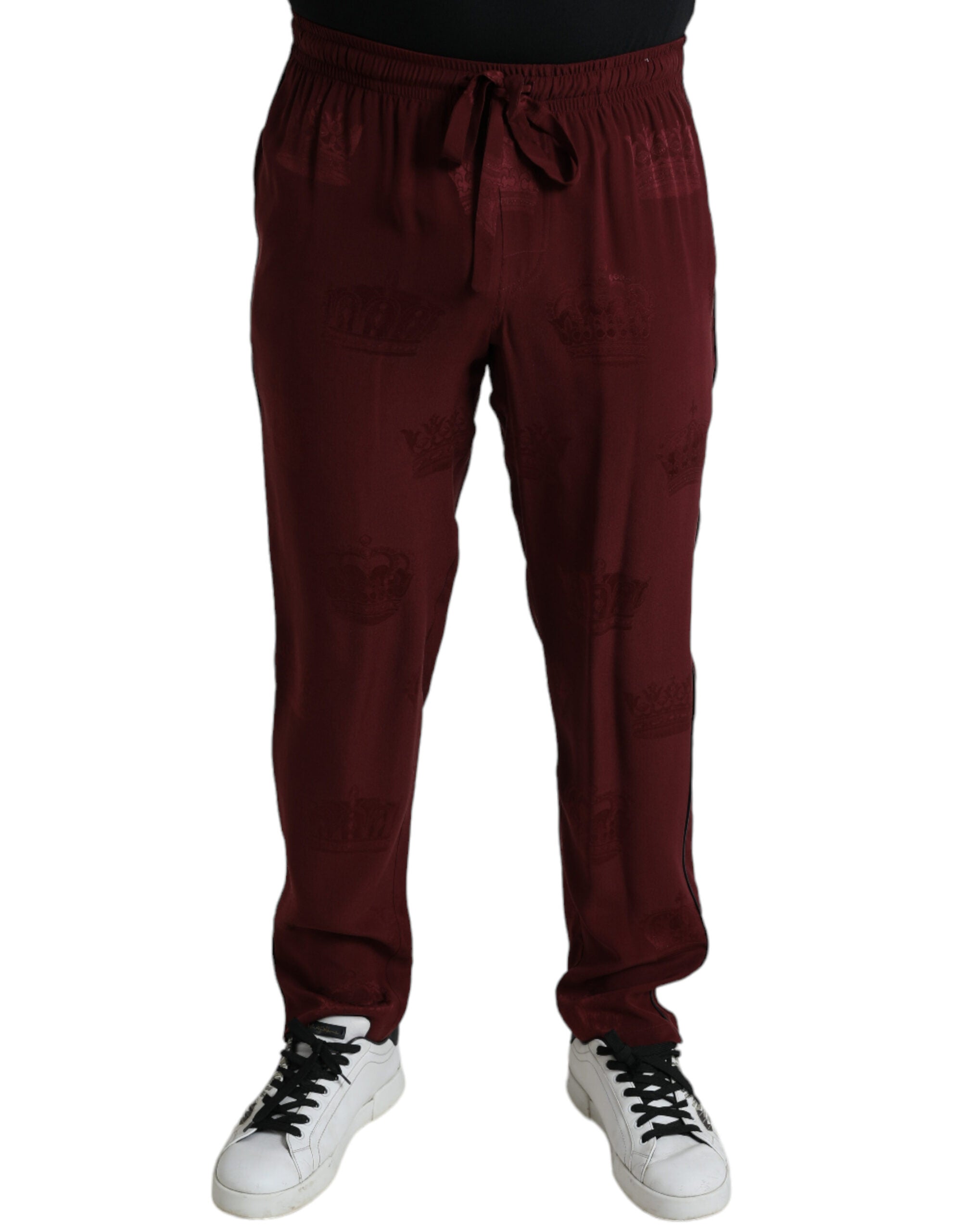 Pantalon de pyjama en soie rouge bivoie avec motif couronne Dolce & Gabbana, style élégant et confortable.