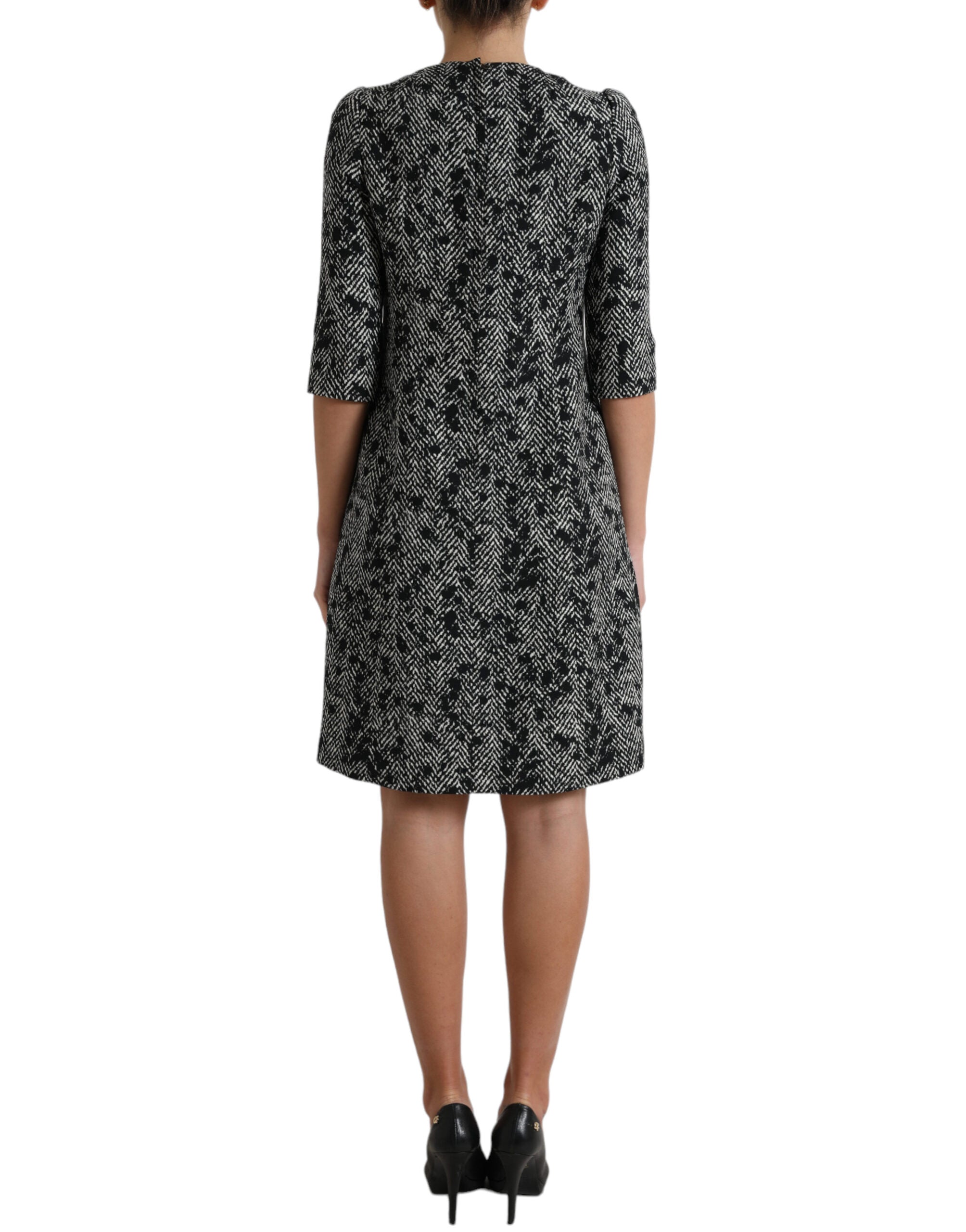Robes courte en polyester noire à motif chevron de Dolce & Gabbana, style élégant et moderne.