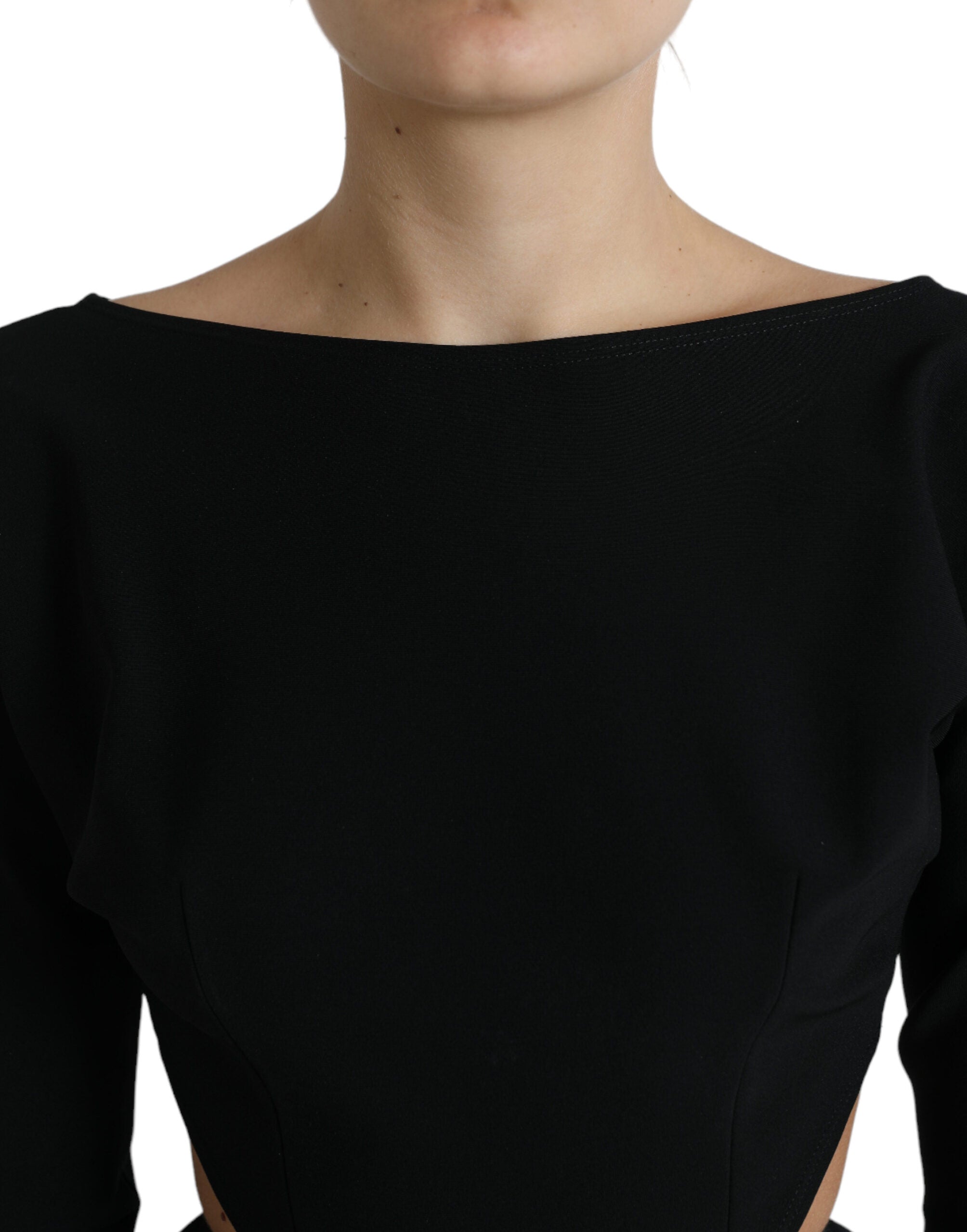 Robe courte noire en viscose à découpes, style A-line avec manches longues, marque Dolce & Gabbana, vue de face.