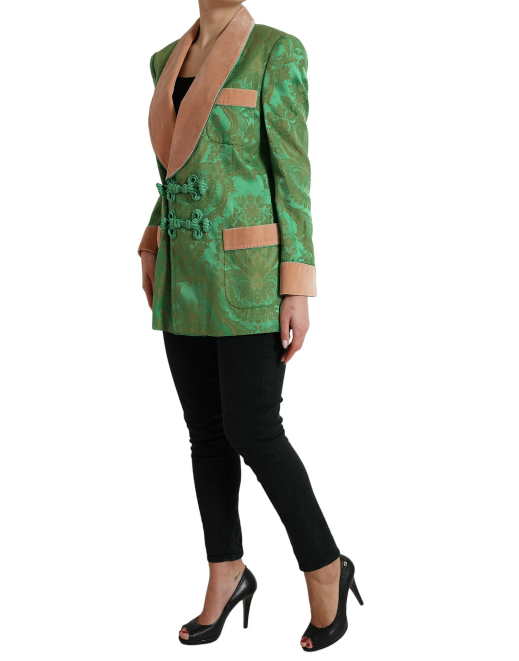 Manteau double boutonnage floral vert Dolce & Gabbana, élégant, avec col et poches, porté sur un mannequin.