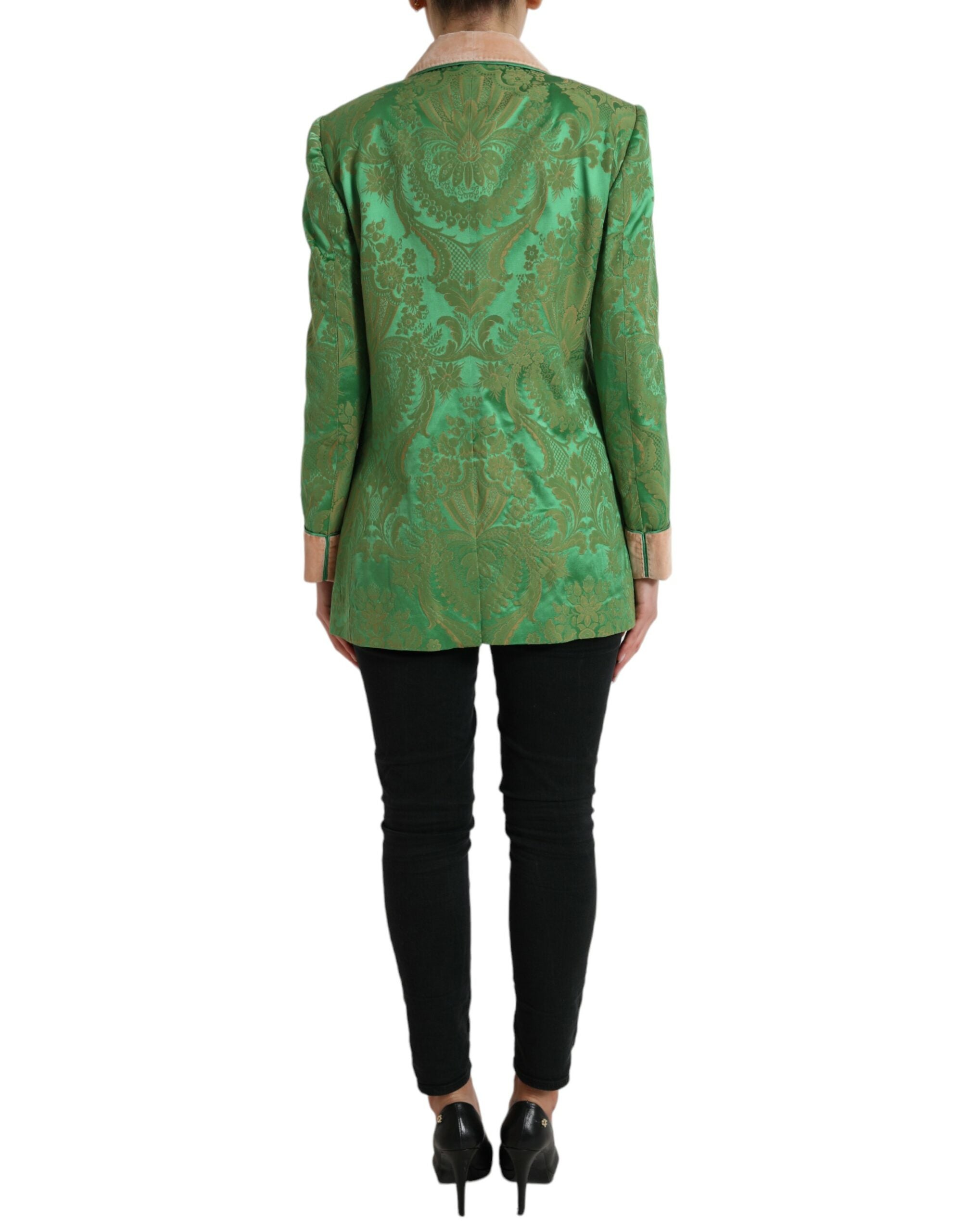 Manteau double boutonnage vert à fleurs de Dolce & Gabbana, veste élégante en tissu floral avec col et poches visibles.