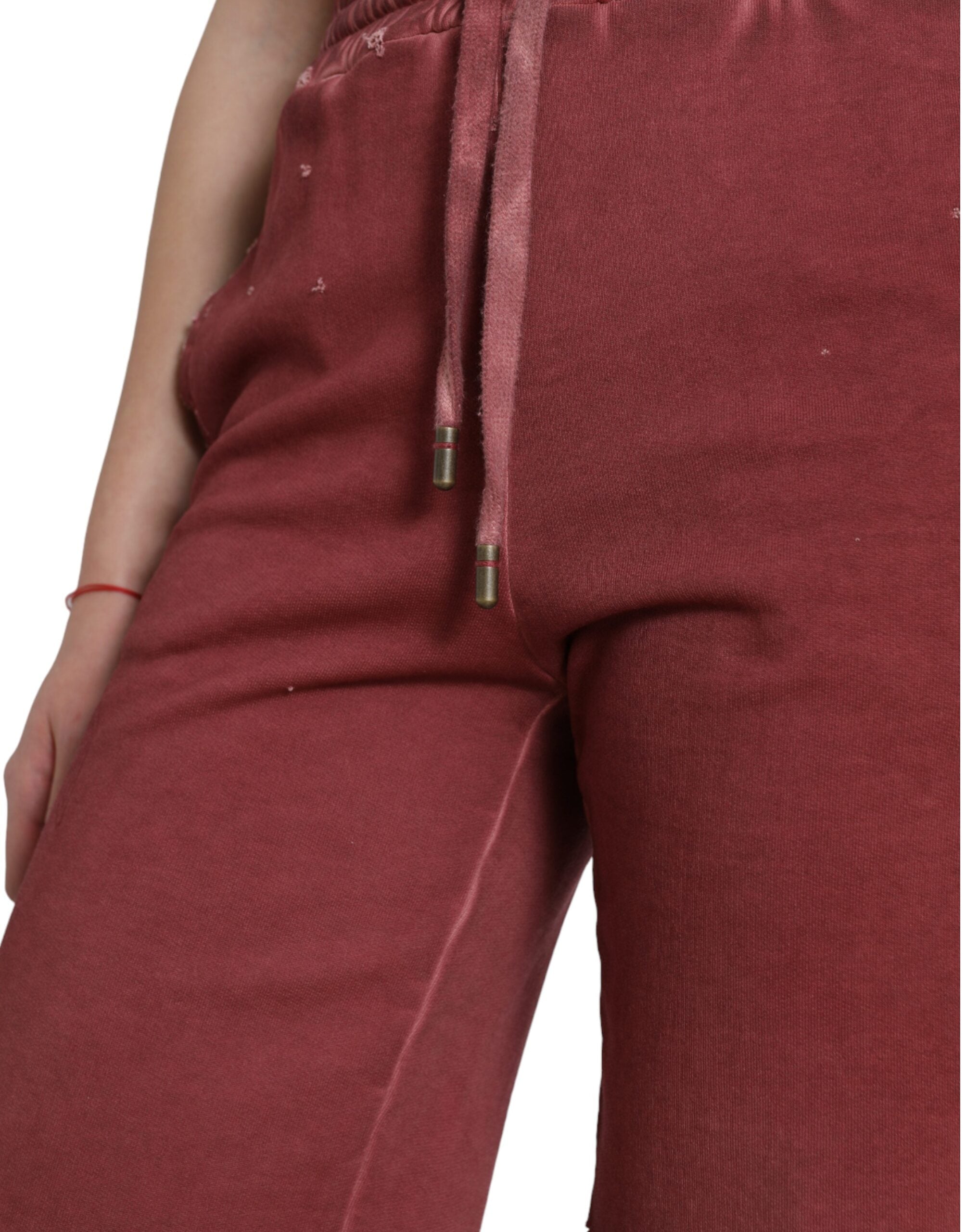 Shorts sweat-shirt en coton marron foncé Dolce & Gabbana à taille haute, décontractés et confortables, visibles sur l'image.