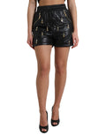 Shorts Dolce & Gabbana noirs à taille haute avec embellissements, en tissu léger, visibles avec détails sophistiqués.