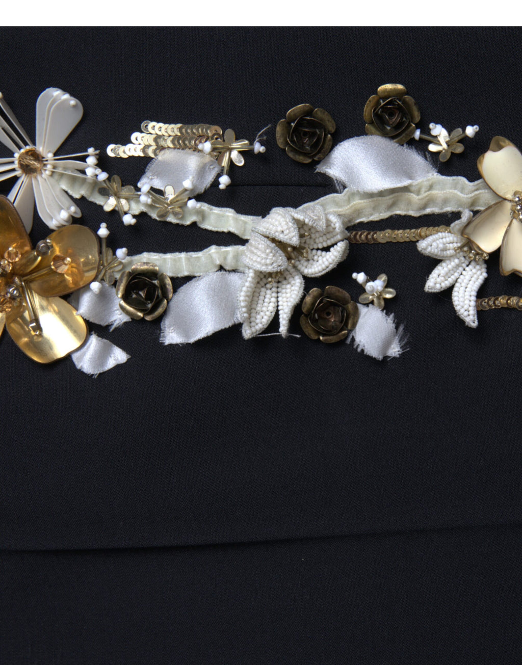 Pantalons noir à taille haute Dolce & Gabbana avec appliqué floral et coupe tapered, vue de face.