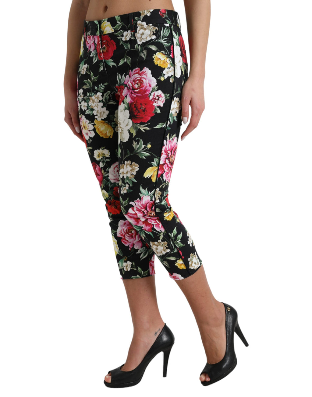 Pantalon cropped noir à taille moyenne Dolce & Gabbana avec motif floral, vue en détail sur le tissu et la coupe.