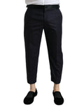Pantalons courts en laine bleue Dolce & Gabbana, coupe tapered, détails élégants, vue de face sur un mannequin.