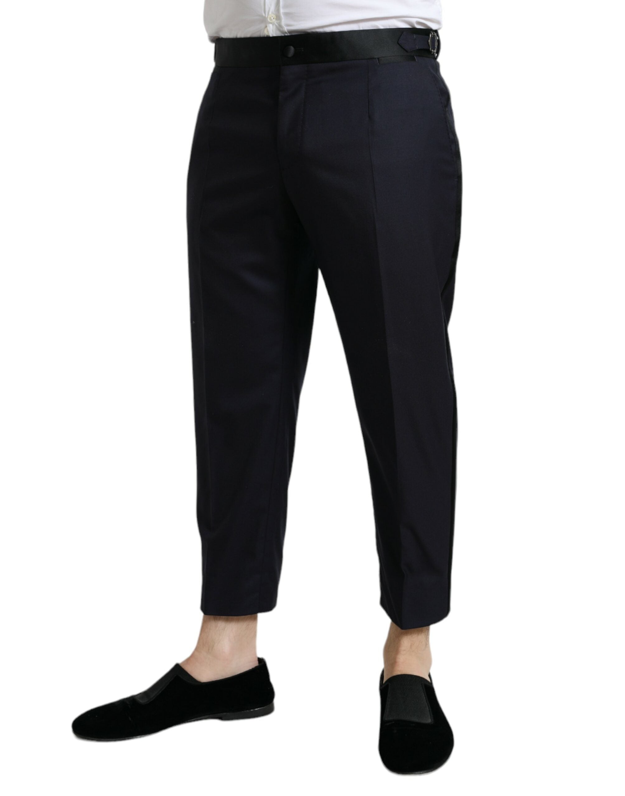 Pantalon cropped en laine bleue Dolce & Gabbana, coupe tapered, pour femme, visible avec détails de couture élégants.