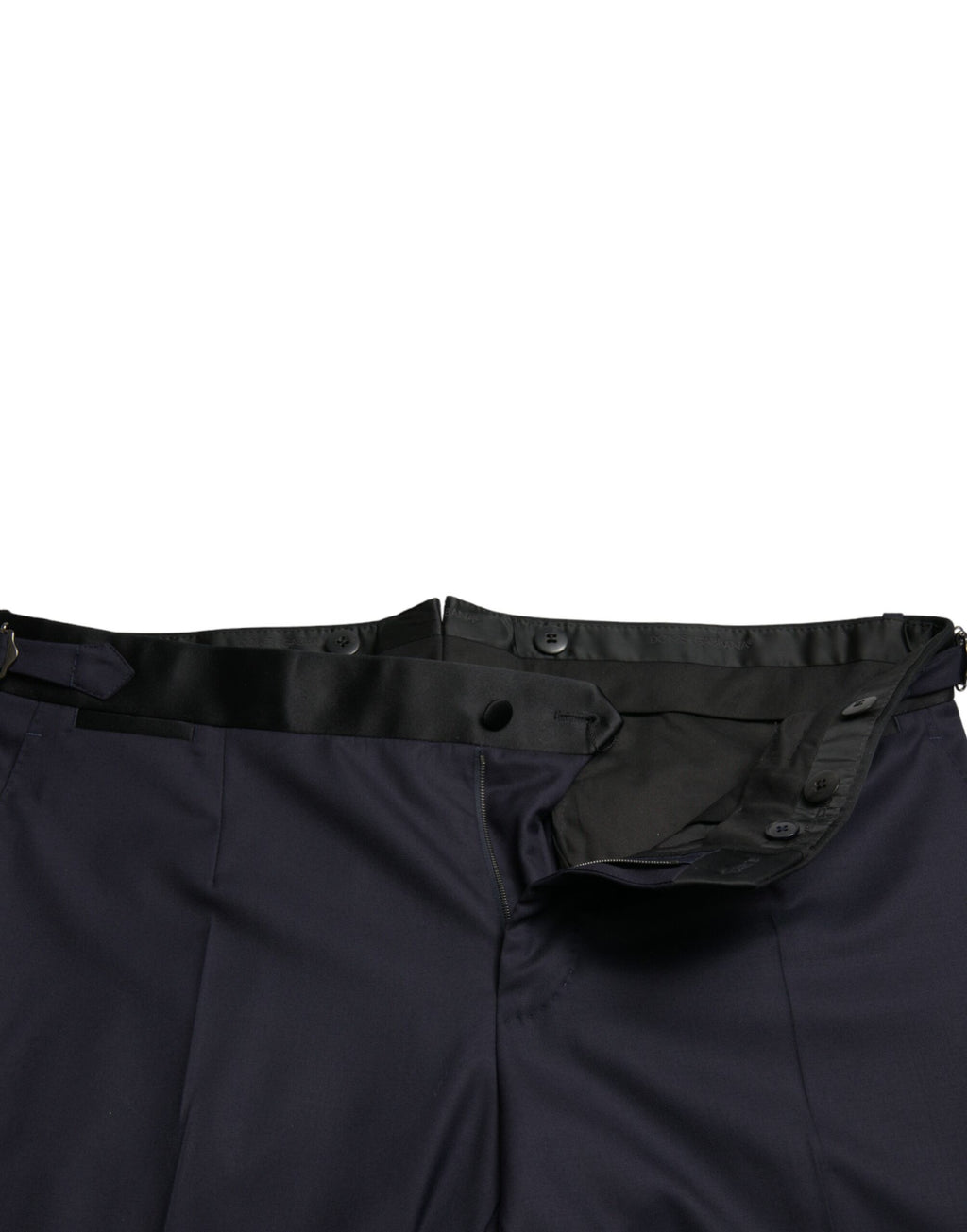 Pantalons courts en laine bleue Dolce & Gabbana tapered, coupe ajustée et élégante, visibles sur l'image.