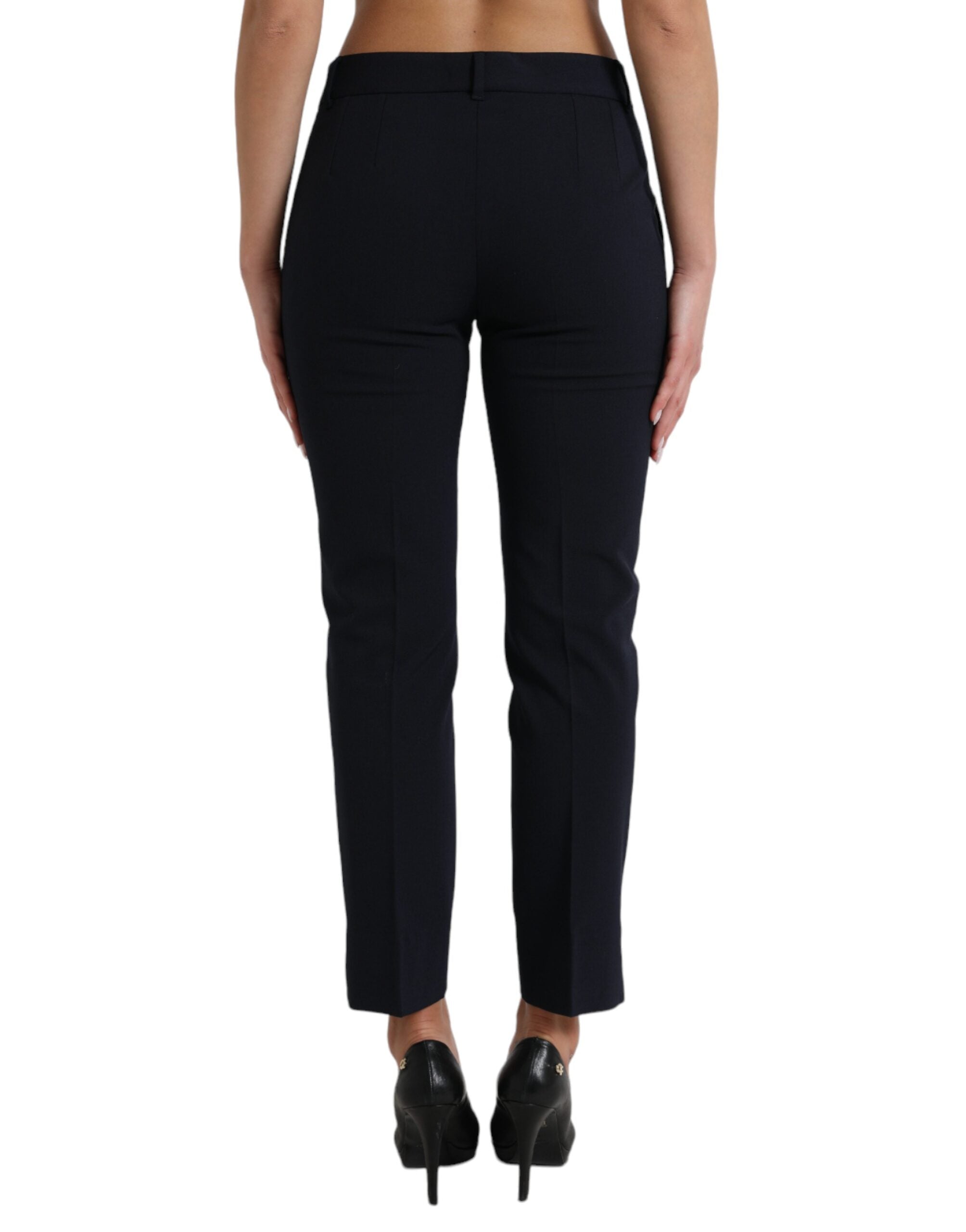 Pantalons cropped bleu Dolce & Gabbana à taille moyenne, coupe tapered, vue de devant sur un fond neutre.