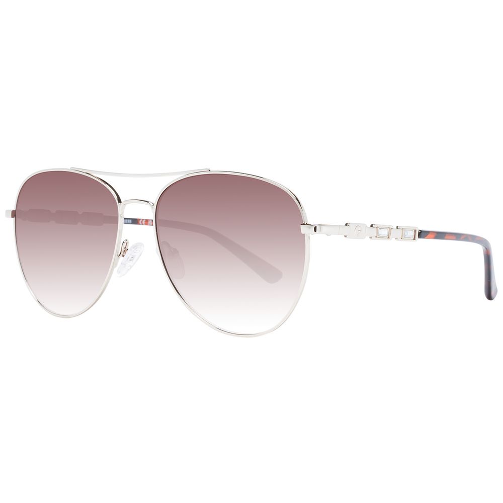 Lunettes de soleil en métal argenté Guess avec monture rectangulaire et verres teintés, mode et élégantes pour l'été.
