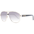 Lunettes de soleil en métal doré Guess, style tendance avec monture élégante et branches fines, pour un look sophistiqué.