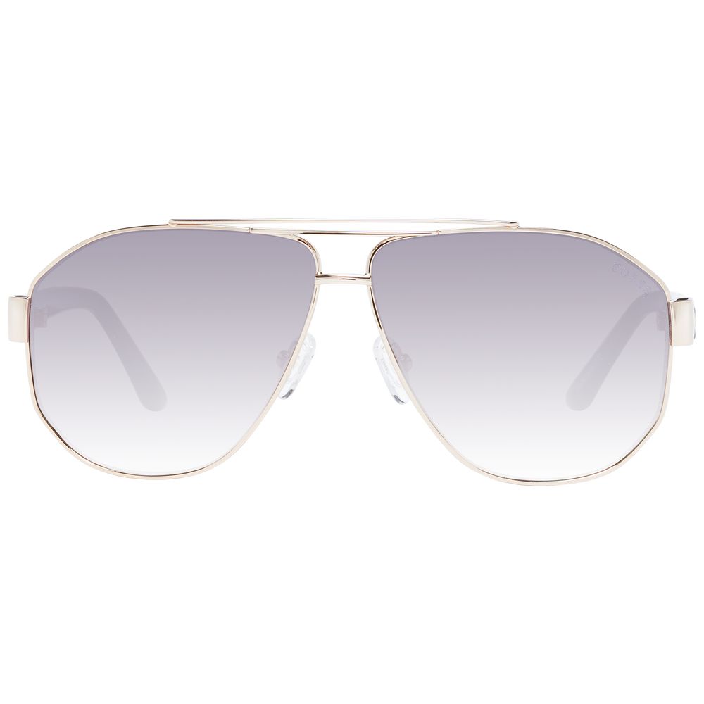 Lunettes de soleil en métal doré Guess, style élégant avec monture fine et verres foncés, pour un look tendance et sophistiqué