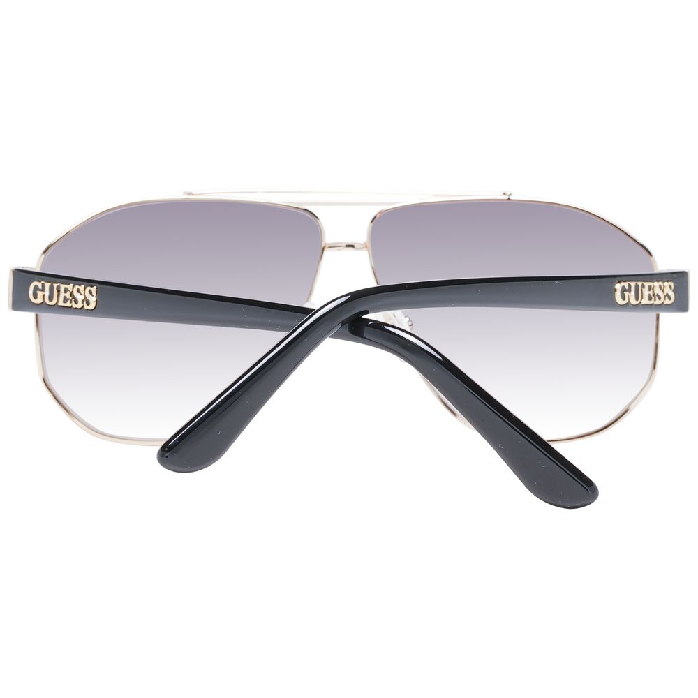 Lunettes de soleil en métal doré Guess, style tendance, monture fine et élégante, pour un look sophistiqué.