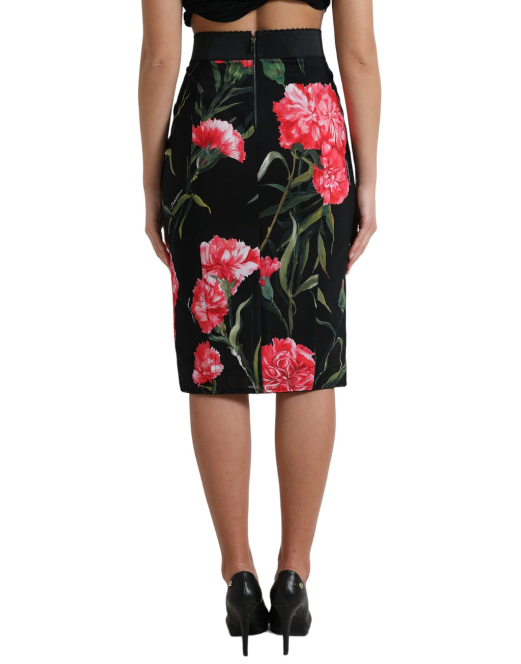 Jupe noire Dolce & Gabbana en forme de crayon, longueur au genou, avec motif de giroflée, tissu élégant et ajusté.