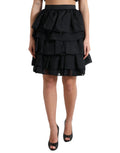 Jupe courte en soie noire à volants et taille haute de Dolce & Gabbana, style aligne et élégant.