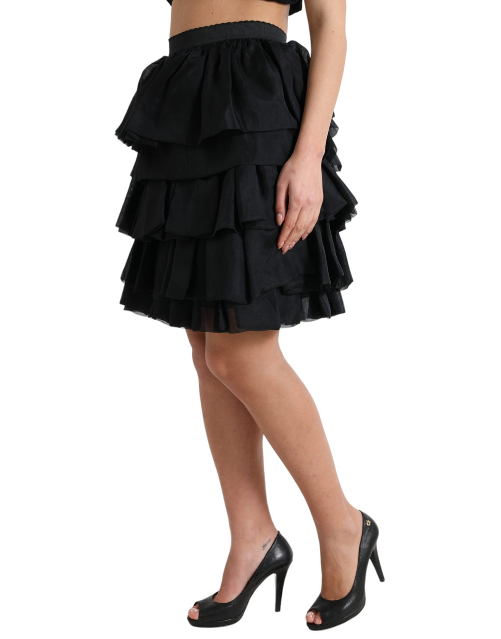 Jupe courte en soie noire Dolce & Gabbana à couches avec taille haute et coupe évasée.