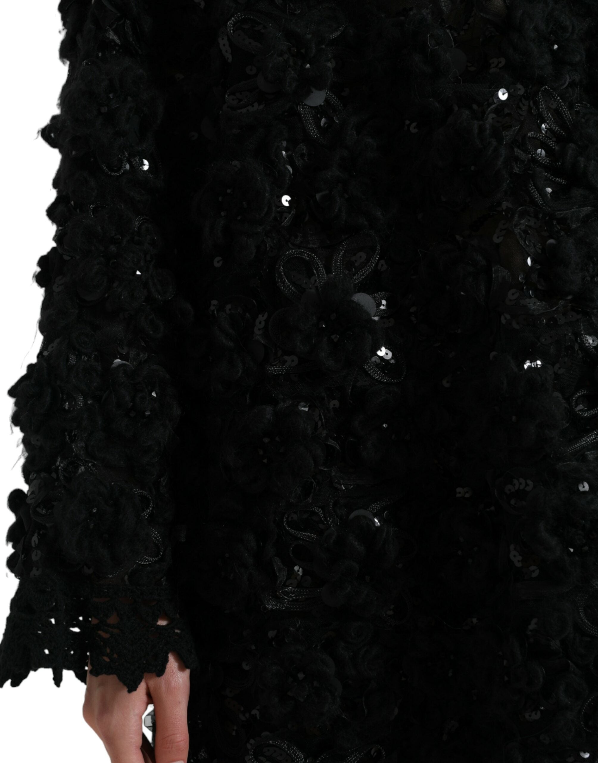 Pull en cachemire noir Dolce & Gabbana avec sequins et embellissements, style élégant et sophistiqué.