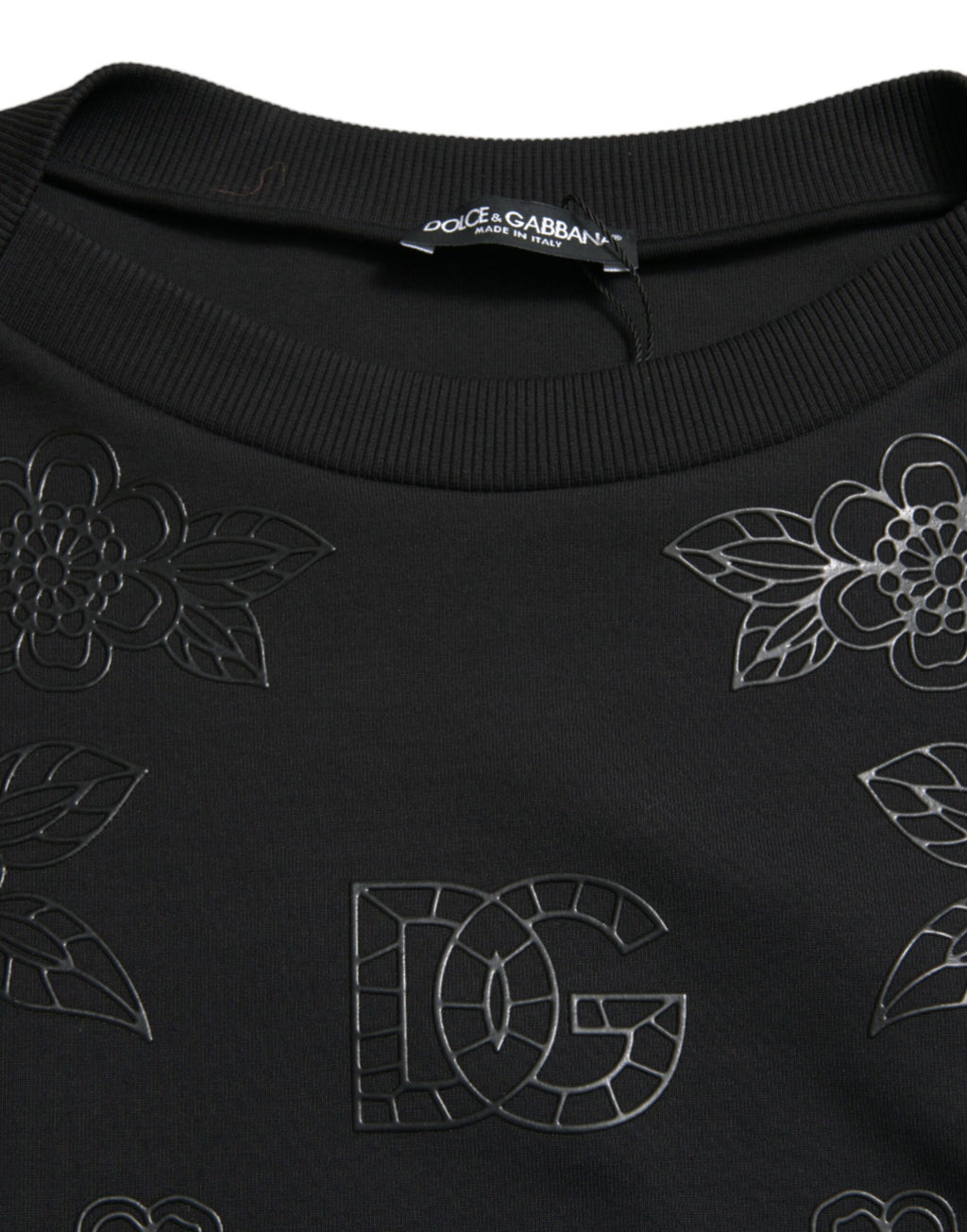 Pull à manches longues Dolce & Gabbana noir avec logo floral appliqué, pull-over élégant et confortable pour femme.