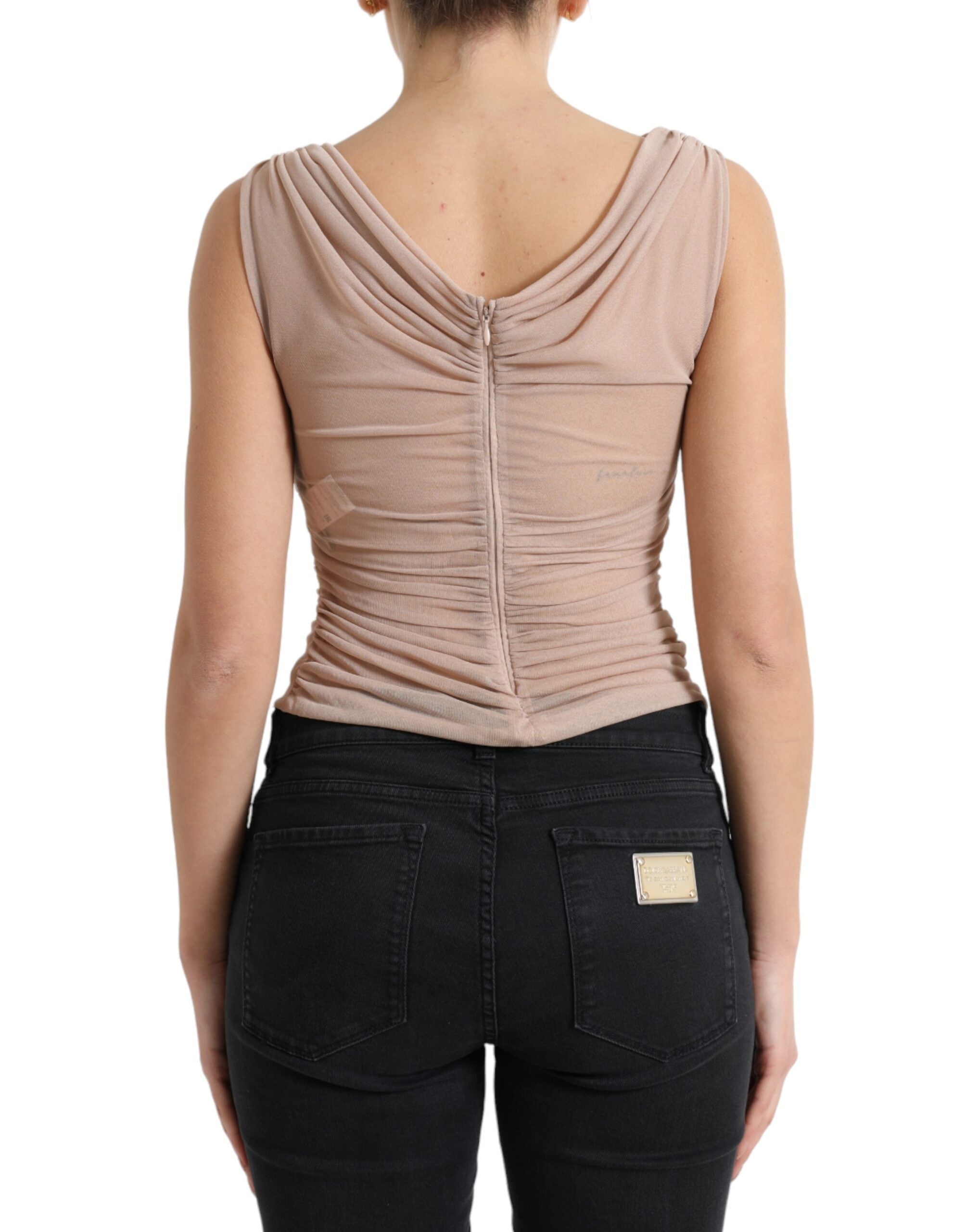 Top sans manches beige en viscose de Dolce & Gabbana avec encolure en V, porté sans manches, élégant et léger.