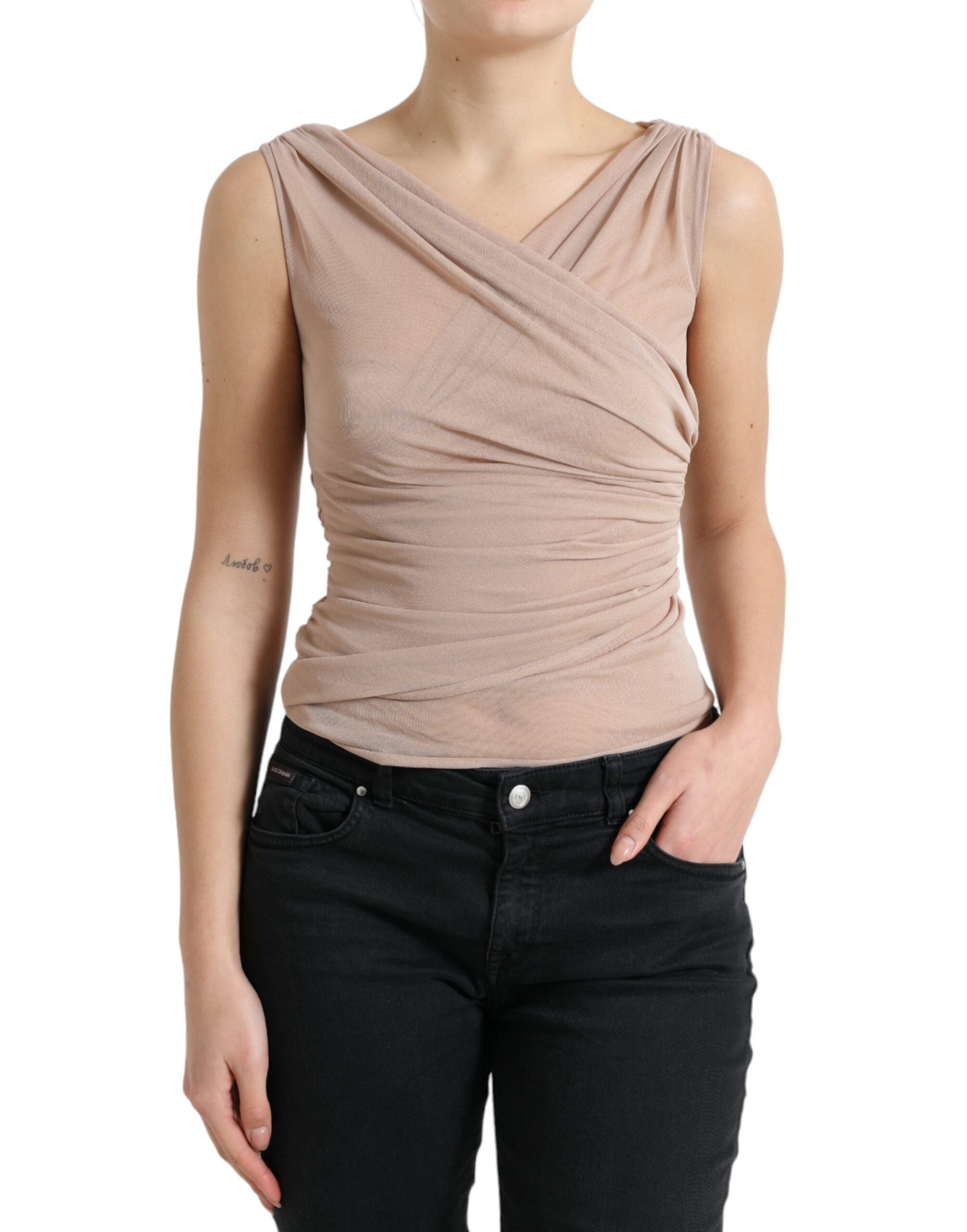 Débardeur sans manches en viscose beige Dolce & Gabbana avec col en V, vue de face.