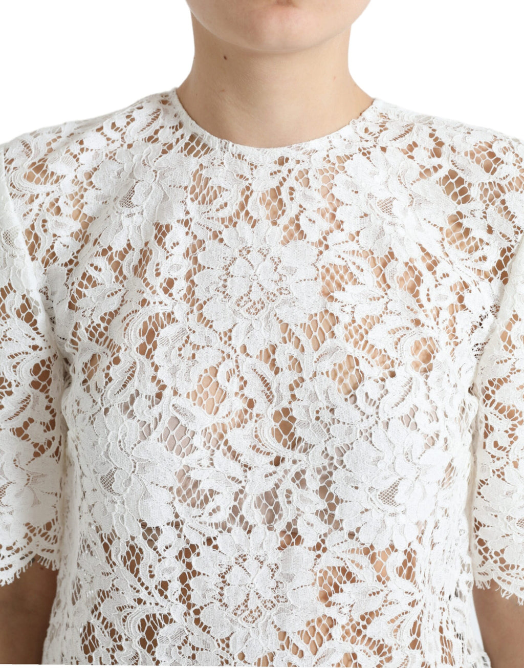 Blouse blanche en dentelle florale en coton de Dolce & Gabbana, col rond, élégante et raffinée.