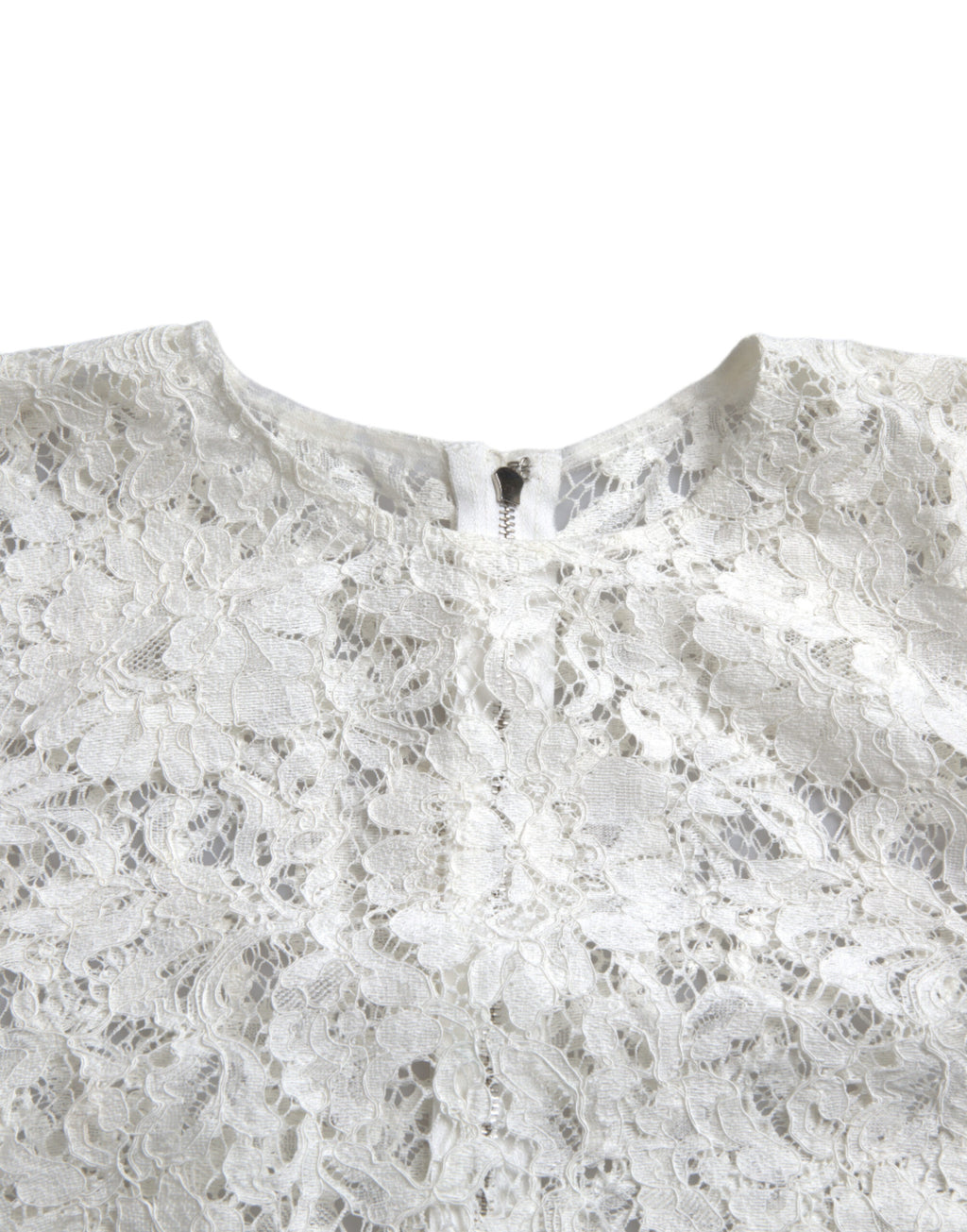 Blouse blanche en coton Dolce & Gabbana avec dentelle florale et col rond, élégante et légère, vue de face.