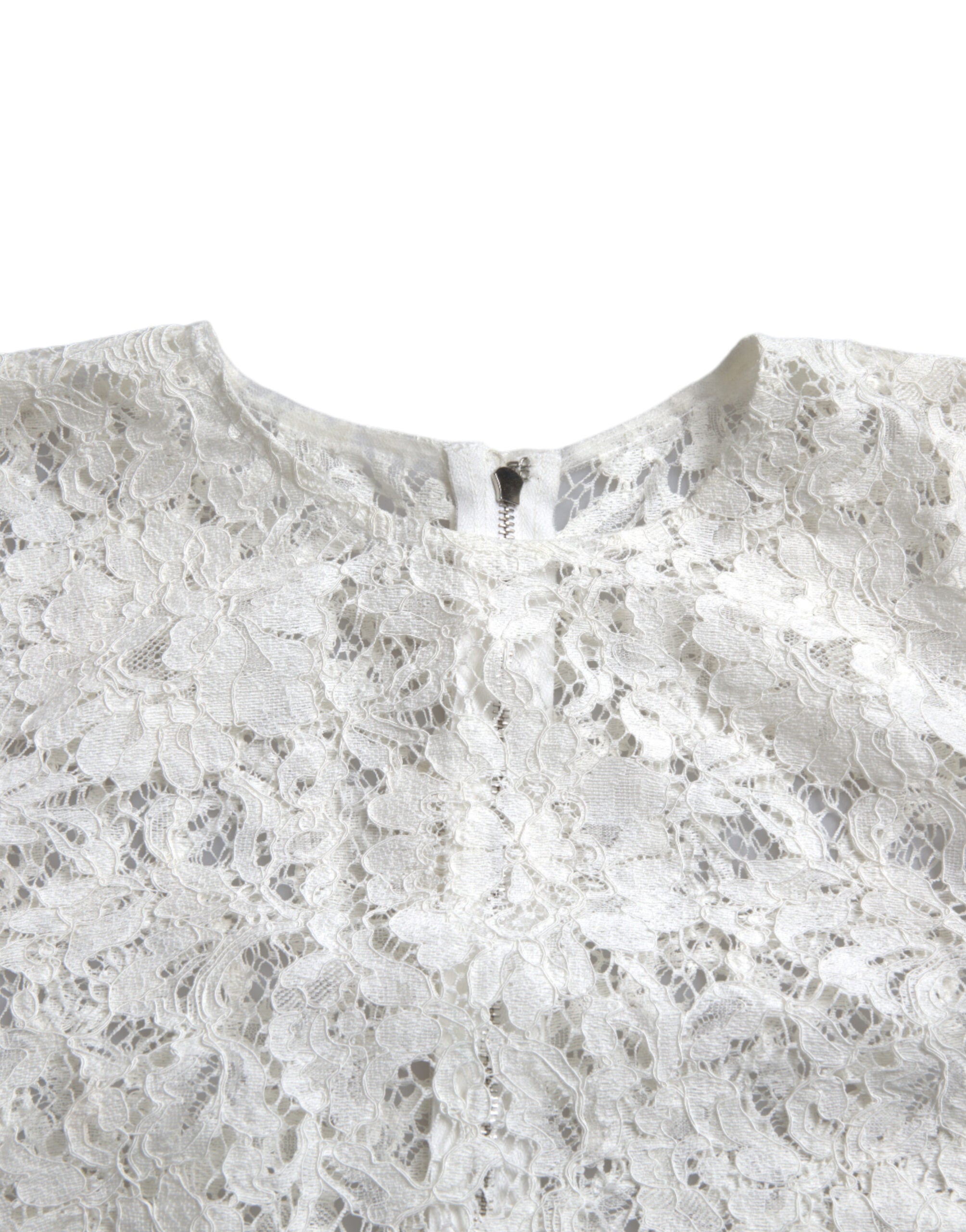 Blouse blanche en coton Dolce & Gabbana avec dentelle florale et col rond, élégante et légère, vue de face.