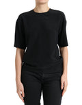 Blouse Dolce & Gabbana en soie noire à col rond et manches courtes, élégante et sophistiquée, vue de face.